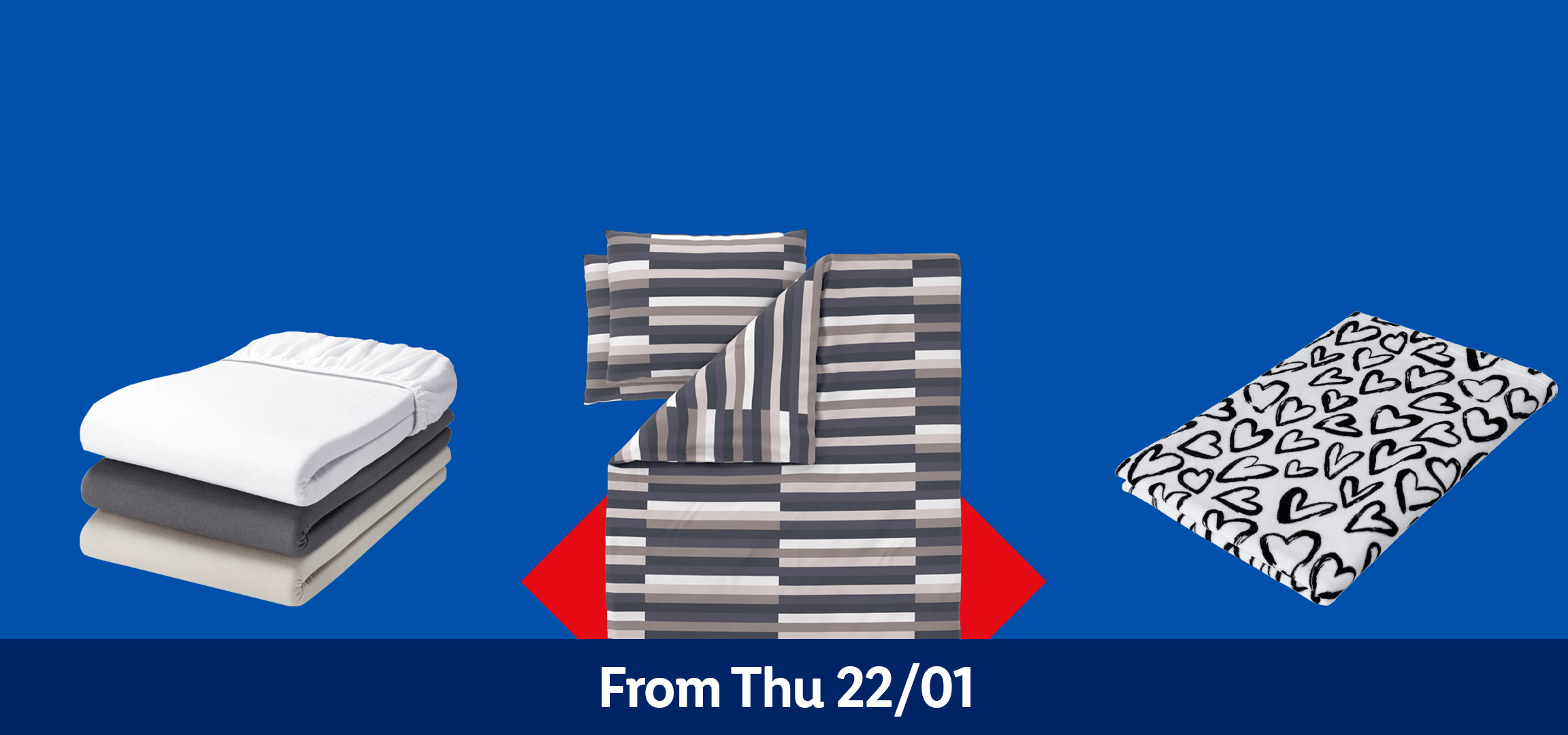 Fitted sheets in white, grey, and beige, with striped and heart-patterned bedding.