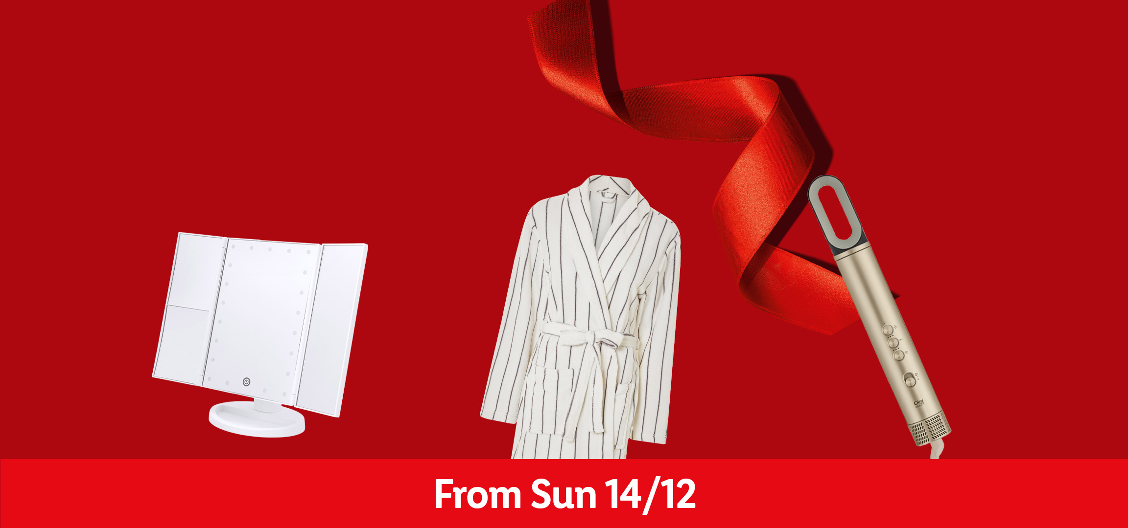 Beauty mirror, hair styler, striped bathrobe, and Crivit massage gun on red background.