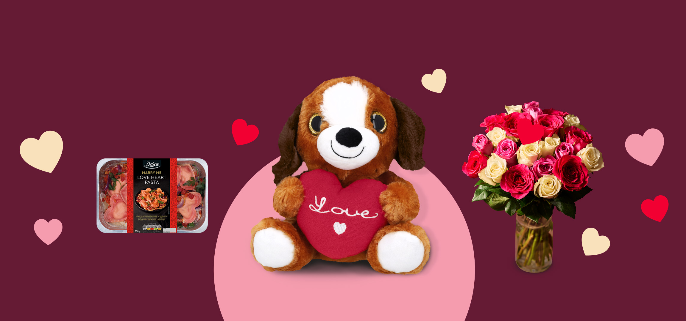 Valentine's Day gifts: heart-shaped pasta, a plush dog with a heart, and a bouquet of roses.