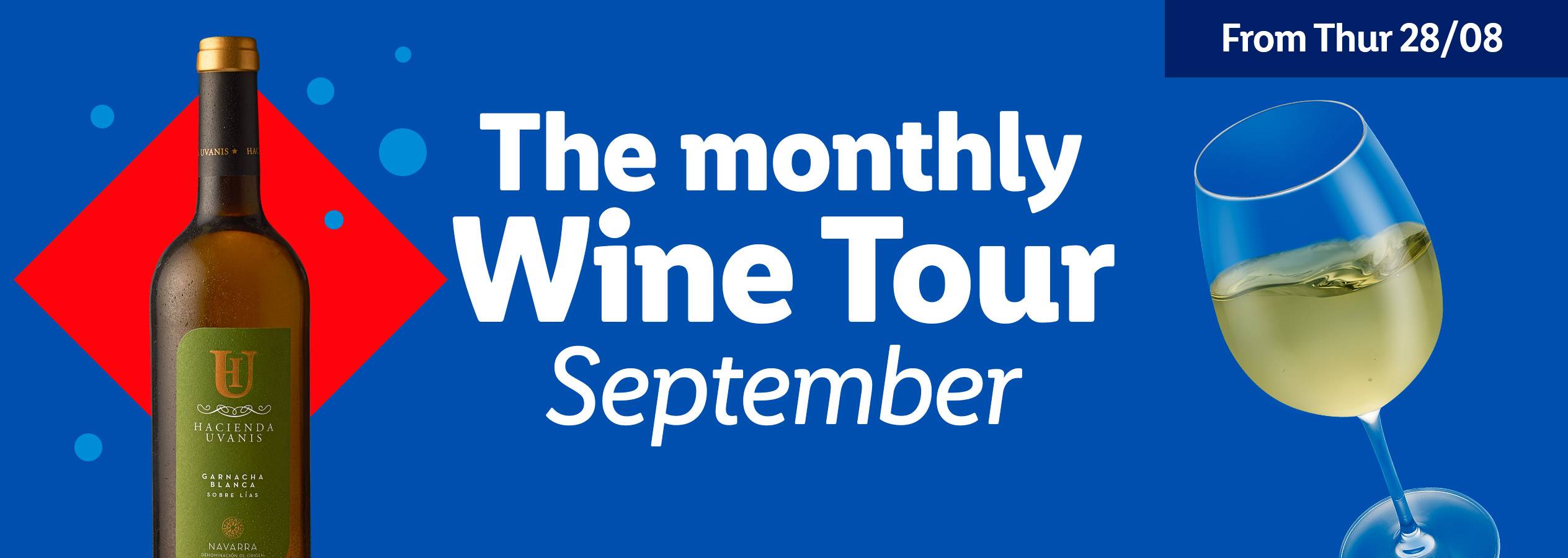 A bottle of Hacienda Uvanis white wine and a glass of white wine on a blue background show casing Lidl's September monthly wine tour..