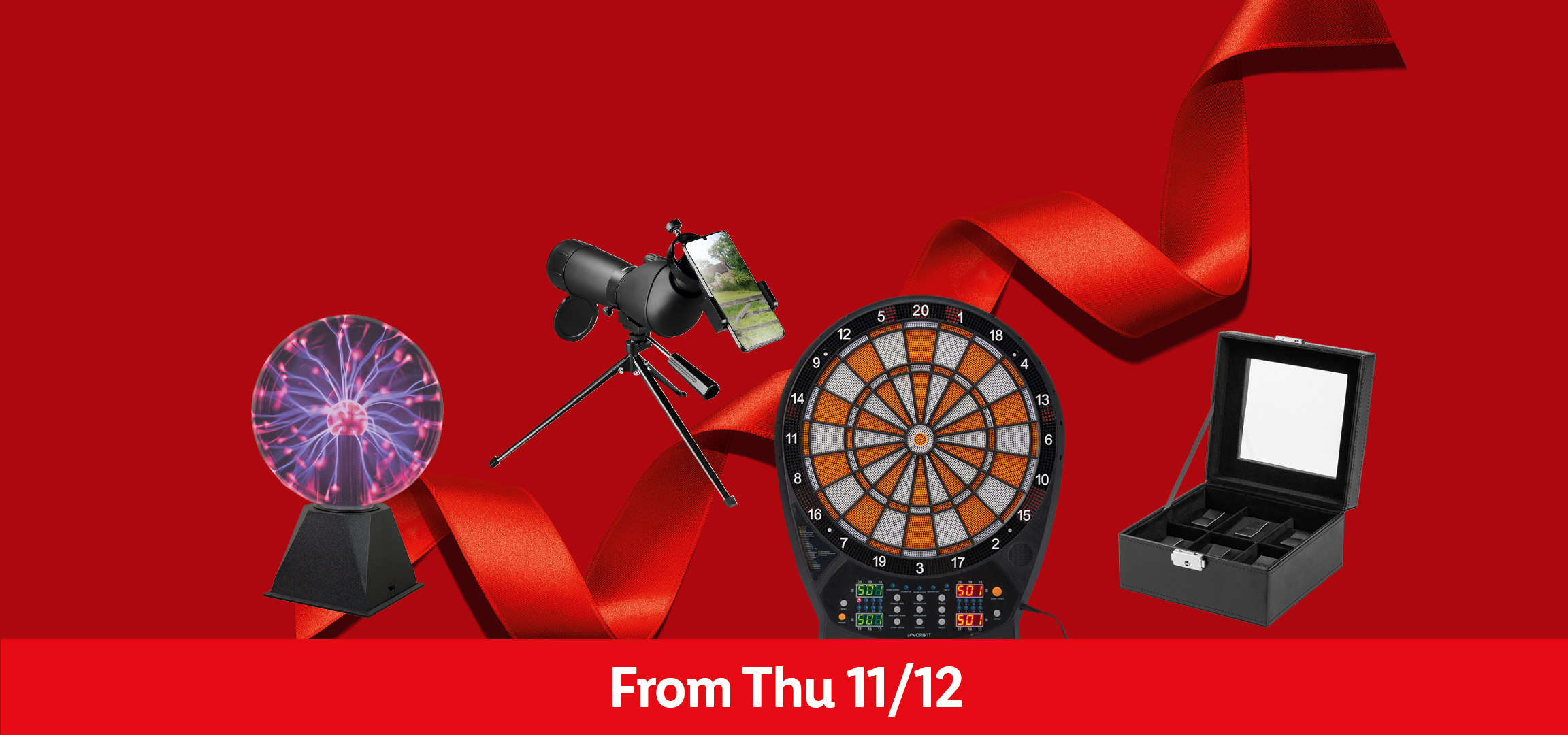 A plasma ball, dartboard, telescope with phone mount, and a jewelry box on a red background with a red ribbon and text 'From Thu 11/12'.