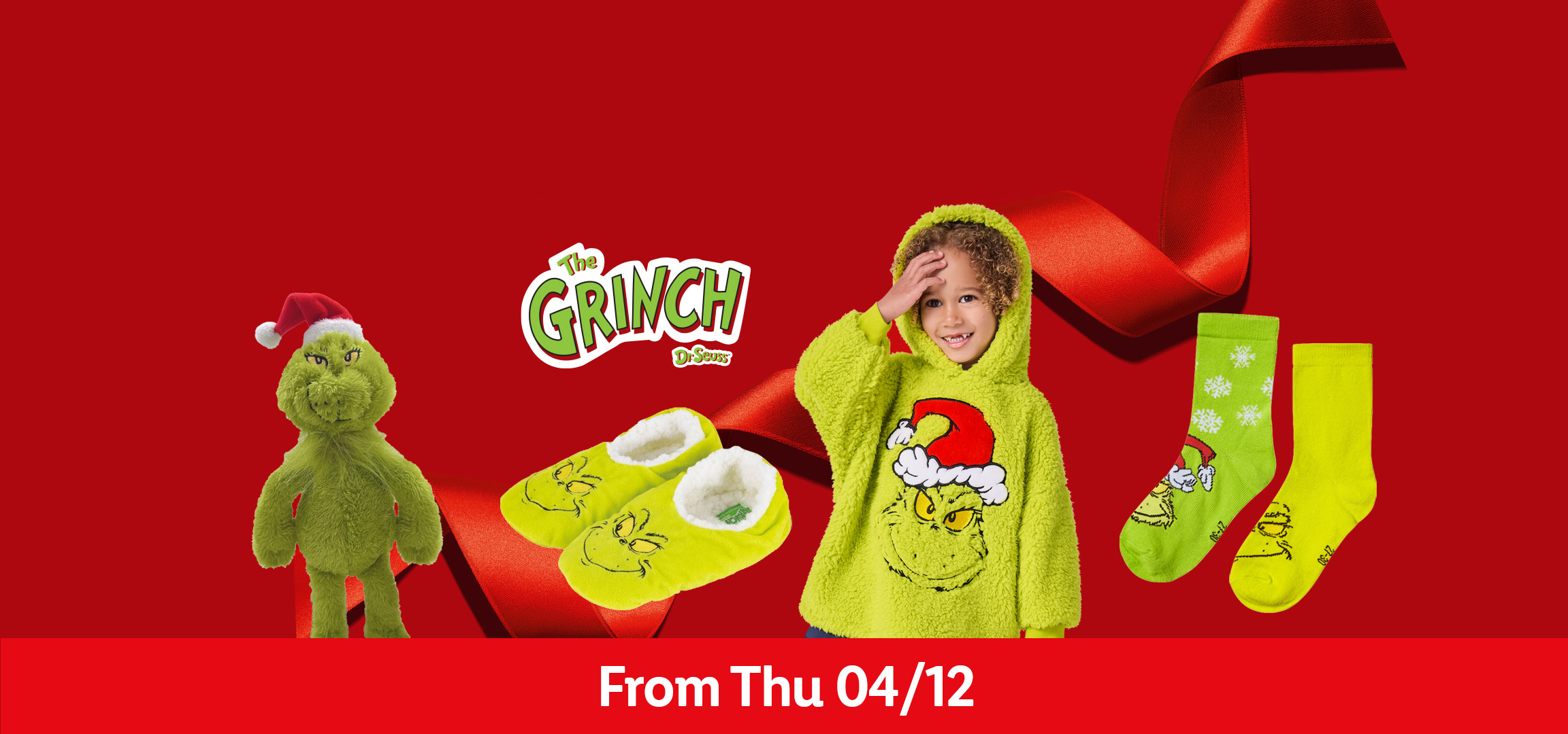 The Grinch themed socks, slippers, hoodie, and plush toy on a red background with a red ribbon. From Thu 04/12.