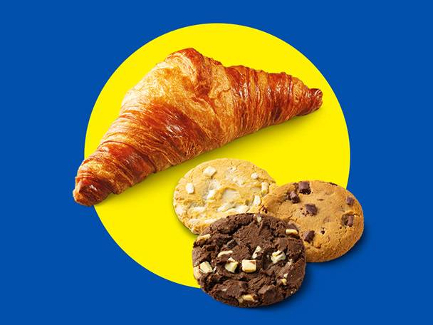 A golden croissant and three cookies (white chocolate, chocolate chip, double chocolate) on a yellow circle.