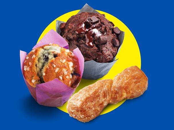 Two muffins (blueberry and chocolate chip) and a glazed pastry on a yellow and blue background.