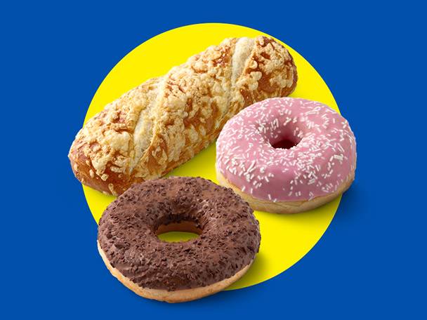 A cheese-topped bread roll, a pink donut with sprinkles, and a chocolate donut.